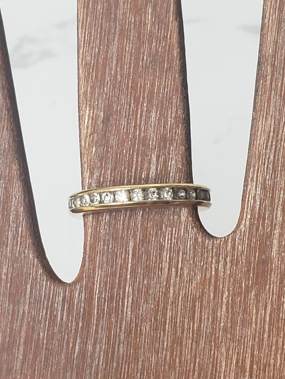 AVON 1994 Goldtone Rhinestone Eternity Band 4.5